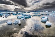 Icebergs floating in the glacial lake of Jökulsarlon