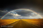 Rainbow over dirt road, Central Highlands
