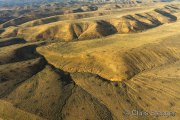 Aerial of a prairie landscape with rolling hills