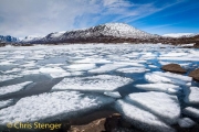 Mountain lake with ice floes in southern Norway  in spring