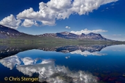Mountains and clouds reflect in a lake in the Stora Sjƶfallet National Park, Sweden Mountains and clouds reflect in a lake in the Stora Sjƶfallet National Park, Sweden